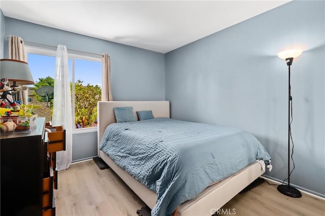 23711 Whale Cv, Laguna Niguel, CA 92677 - bedroom with wood finished floors and baseboards