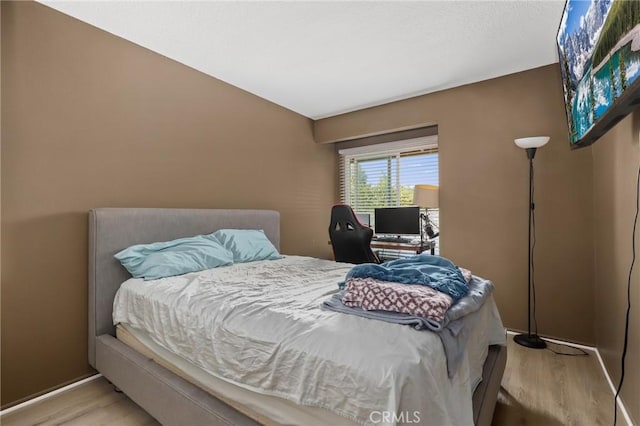 23711 Whale Cv, Laguna Niguel, CA 92677 - bedroom featuring wood finished floors and baseboards