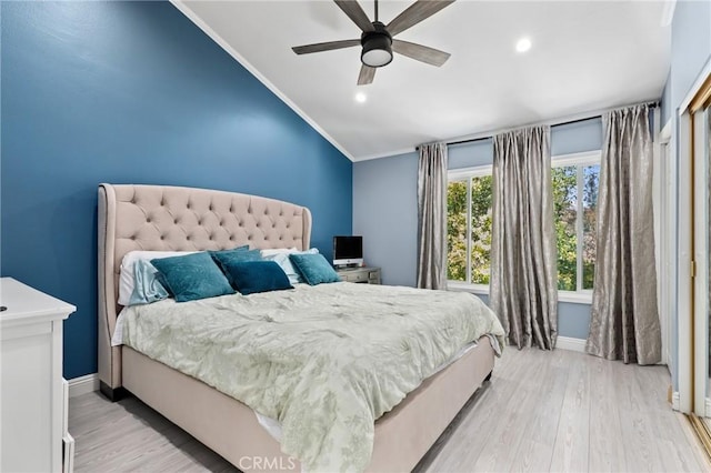 23711 Whale Cv, Laguna Niguel, CA 92677 - bedroom featuring vaulted ceiling, light wood finished floors, recessed lighting, crown molding, and a ceiling fan