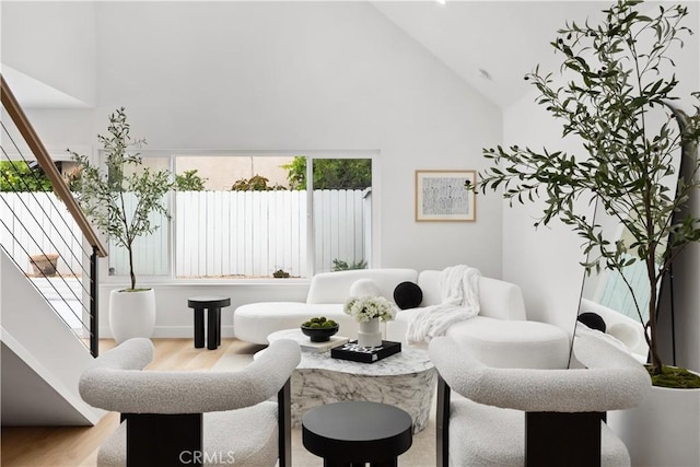 24091 Marathon St, Mission Viejo, CA 92691 - sitting room with high vaulted ceiling, stairway, and wood finished floors