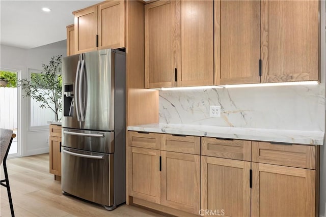 24091 Marathon St, Mission Viejo, CA 92691 - kitchen featuring stainless steel refrigerator with ice dispenser, decorative backsplash, light wood-style flooring, recessed lighting, and light brown cabinets
