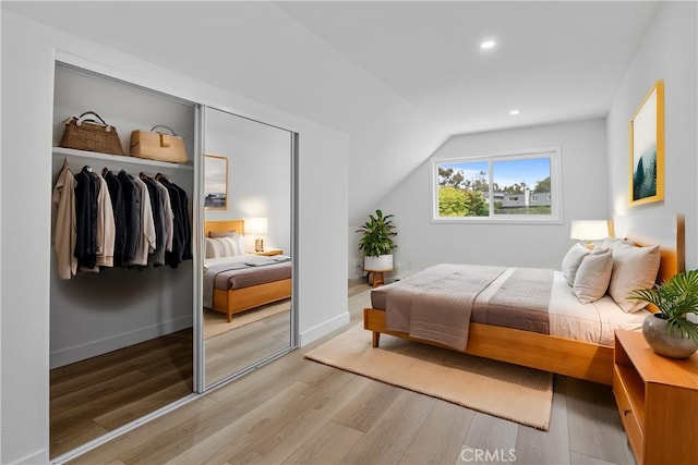 24091 Marathon St, Mission Viejo, CA 92691 - bedroom with light wood-style floors, a closet, recessed lighting, and lofted ceiling