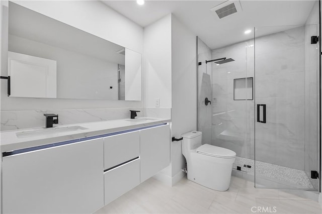 24091 Marathon St, Mission Viejo, CA 92691 - full bathroom with double vanity, a marble finish shower, and recessed lighting