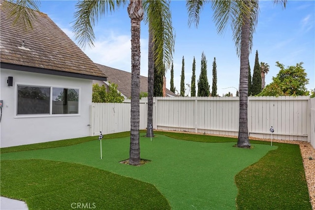 24091 Marathon St, Mission Viejo, CA 92691 - fenced backyard with a putting area