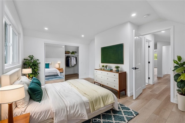 24091 Marathon St, Mission Viejo, CA 92691 - bedroom featuring light wood finished floors, multiple windows, a closet, recessed lighting, and lofted ceiling