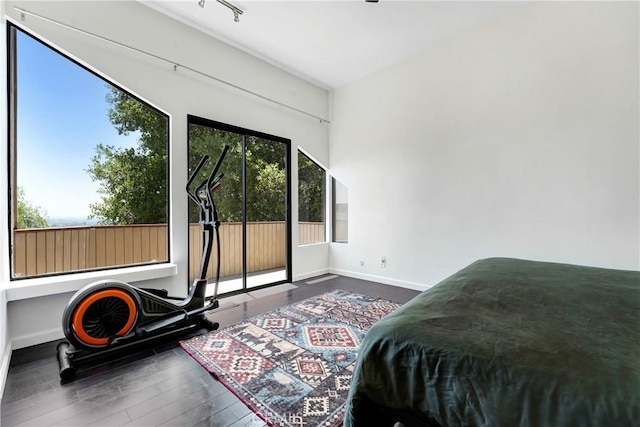 8742 Azul Dr, West Hills, CA 91304 - bedroom featuring wood finished floors and access to outside