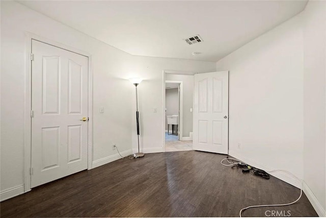 43939 Glenraven Rd, Lancaster, CA 93535 - unfurnished bedroom featuring wood finished floors and baseboards