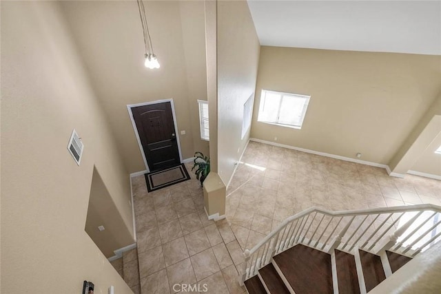 43939 Glenraven Rd, Lancaster, CA 93535 - tiled entryway with a high ceiling and stairs