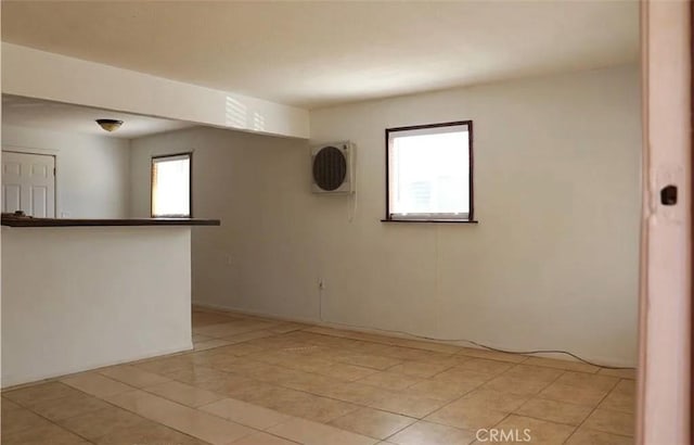 16226 Pine St, Hesperia, CA 92345 - unfurnished room with plenty of natural light and light tile patterned floors