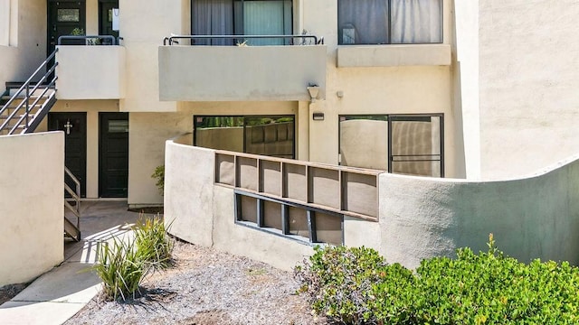 13104 Glen Ct Unit 7, Chino Hills, CA 91709 - doorway to property with a balcony and stucco siding