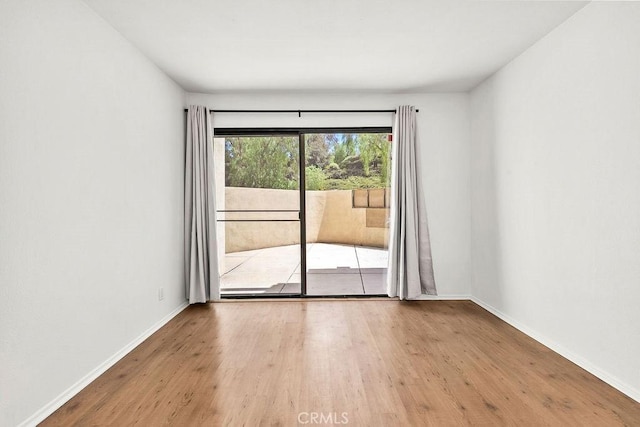 13104 Glen Ct Unit 7, Chino Hills, CA 91709 - empty room with wood finished floors and baseboards