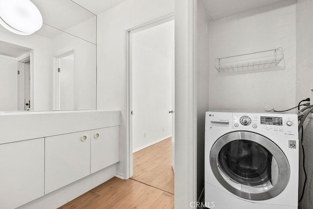 13104 Glen Ct Unit 7, Chino Hills, CA 91709 - laundry room featuring washer / clothes dryer and light wood-type flooring