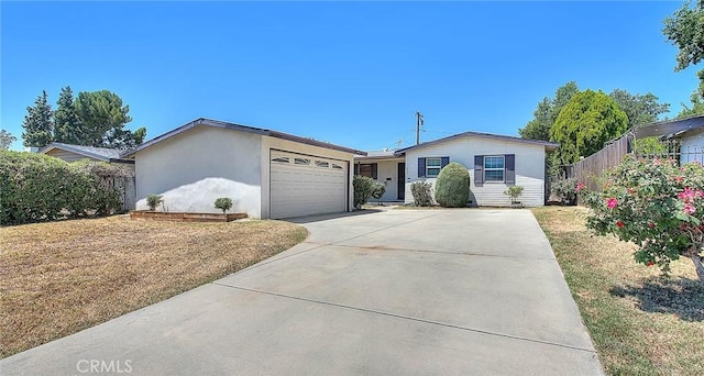 833 W Orangepath St, Glendora, CA 91741 - ranch-style home featuring a garage, driveway, and stucco siding