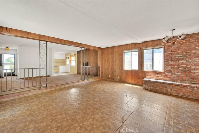833 W Orangepath St, Glendora, CA 91741 - spare room with wooden walls and a textured ceiling