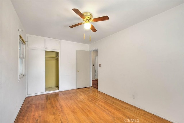 833 W Orangepath St, Glendora, CA 91741 - unfurnished bedroom with light wood-type flooring, a closet, and ceiling fan