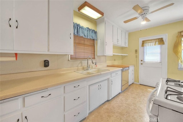 833 W Orangepath St, Glendora, CA 91741 - kitchen featuring white range with gas stovetop, ceiling fan, white cabinets, and light countertops