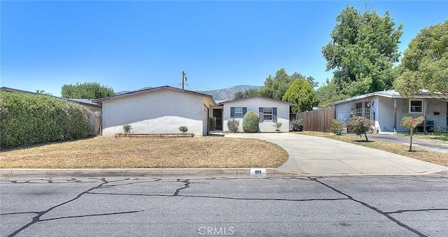 833 W Orangepath St, Glendora, CA 91741 - ranch-style house with concrete driveway and stucco siding
