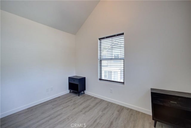 5926 Gran Paseo Way, Atascadero, CA 93422 - spare room featuring light wood finished floors and high vaulted ceiling