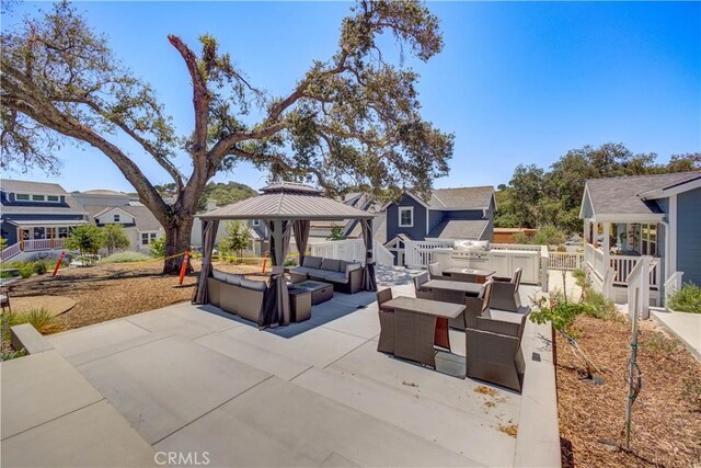 5926 Gran Paseo Way, Atascadero, CA 93422 - view of patio with an outdoor hangout area, a gazebo, a residential view, and an outdoor kitchen