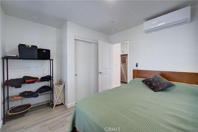 5926 Gran Paseo Way, Atascadero, CA 93422 - bedroom featuring a wall mounted AC, wood finished floors, and a closet