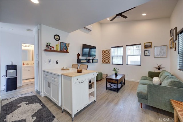 5926 Gran Paseo Way, Atascadero, CA 93422 - kitchen with open shelves, a ceiling fan, white cabinetry, light wood-style floors, and recessed lighting