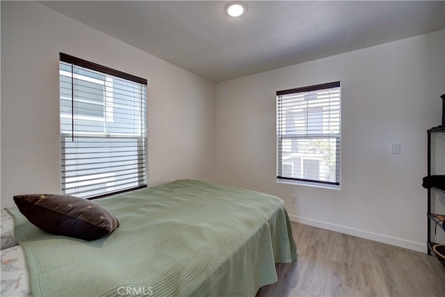 5926 Gran Paseo Way, Atascadero, CA 93422 - bedroom with light wood-style floors and baseboards