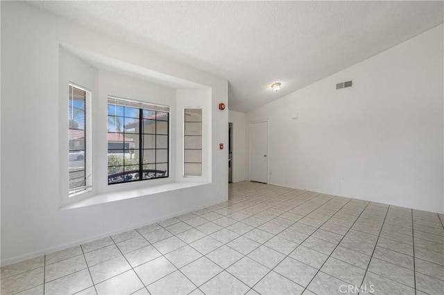 41384 Collegian Way, Hemet, CA 92544 - empty room with a textured ceiling and lofted ceiling
