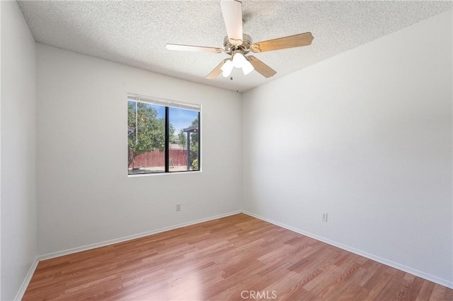 41384 Collegian Way, Hemet, CA 92544 - unfurnished room featuring light wood-style flooring, a textured ceiling, and ceiling fan