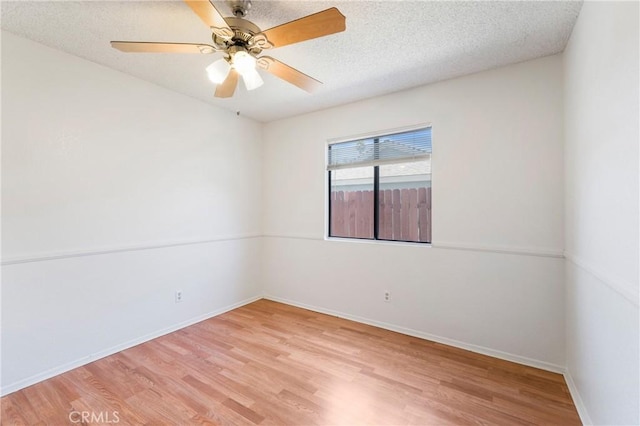 41384 Collegian Way, Hemet, CA 92544 - spare room with light wood finished floors, ceiling fan, and a textured ceiling