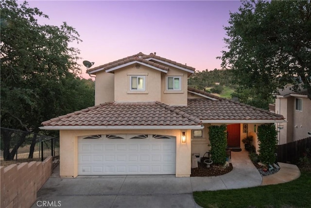 8674 Paseo De Vaca, Atascadero, CA 93422 - mediterranean / spanish-style house with a tile roof, driveway, stucco siding, and a garage