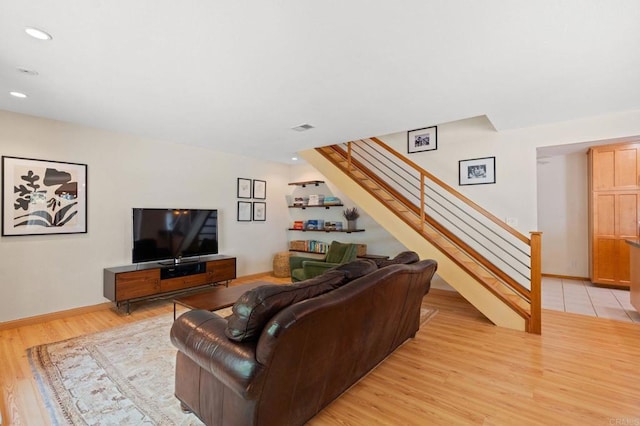 2005 Countrywood Ct, Encinitas, CA 92024 - living room with stairway, light wood finished floors, and recessed lighting