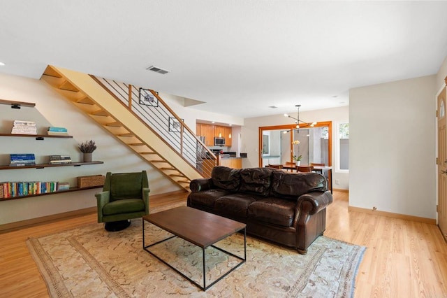2005 Countrywood Ct, Encinitas, CA 92024 - living room featuring stairs and light wood-type flooring