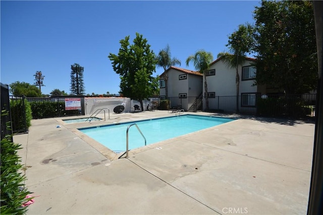 16377 Lakeshore Dr Unit 4D, Lake Elsinore, CA 92530 - community pool featuring a patio