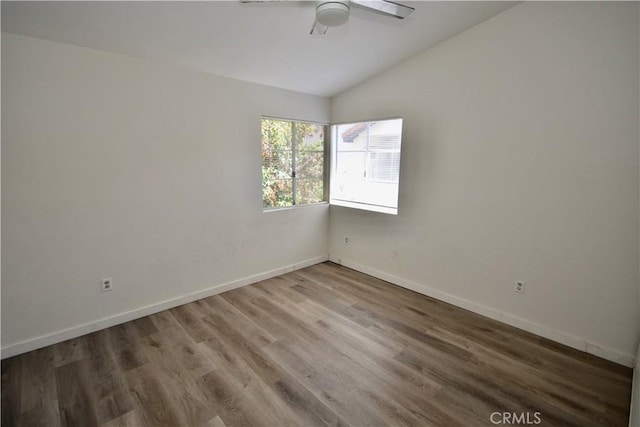 16377 Lakeshore Dr Unit 4D, Lake Elsinore, CA 92530 - unfurnished room with vaulted ceiling, a ceiling fan, and wood finished floors