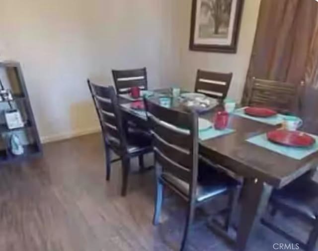62026 Grand View Cir, Joshua Tree, CA 92252 - dining area featuring wood finished floors and baseboards
