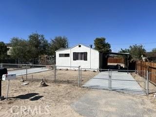 62026 Grand View Cir, Joshua Tree, CA 92252 - view of front facade featuring a gate