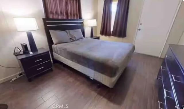 62026 Grand View Cir, Joshua Tree, CA 92252 - bedroom featuring dark wood-style floors