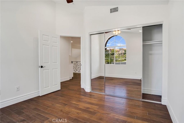 19900 Mariposa Creek Way, Porter Ranch, CA 91326 - unfurnished bedroom featuring hardwood / wood-style floors, a chandelier, and a closet