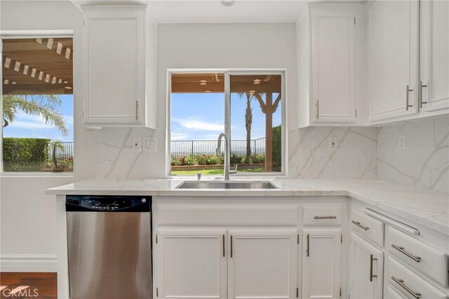 19900 Mariposa Creek Way, Porter Ranch, CA 91326 - kitchen with stainless steel dishwasher and white cabinetry