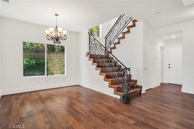 19900 Mariposa Creek Way, Porter Ranch, CA 91326 - foyer entrance featuring stairway, a chandelier, wood finished floors, and recessed lighting