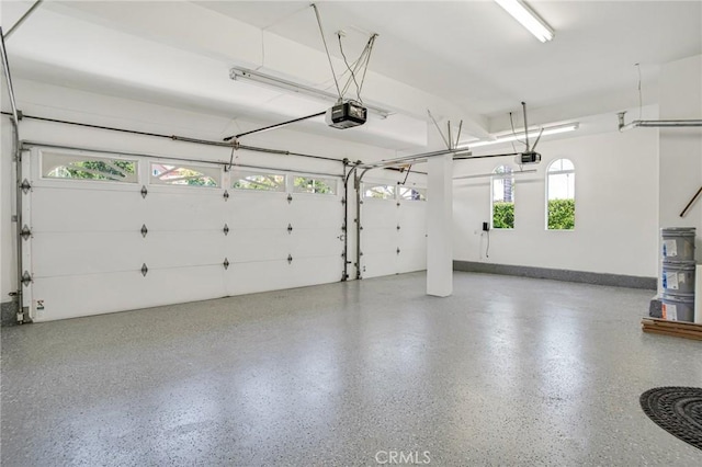 19900 Mariposa Creek Way, Porter Ranch, CA 91326 - garage with a garage door opener