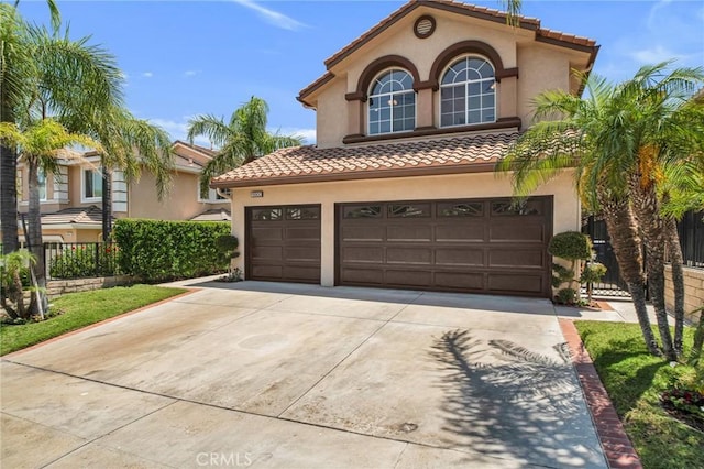 19900 Mariposa Creek Way, Porter Ranch, CA 91326 - mediterranean / spanish home featuring stucco siding, concrete driveway, a garage, and a tile roof