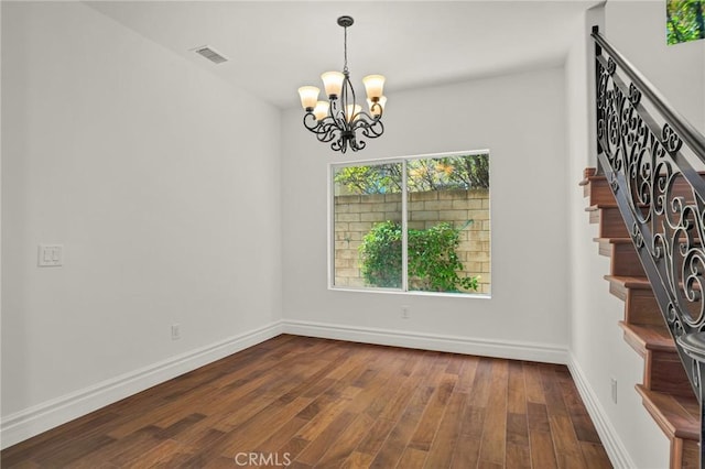 19900 Mariposa Creek Way, Porter Ranch, CA 91326 - unfurnished room with a chandelier, dark wood-style flooring, and stairway
