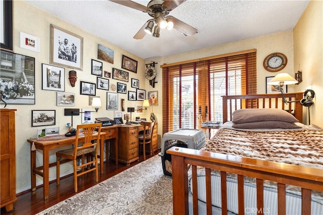 1595 15th St, Los Osos, CA 93402 - bedroom with an office area, wood finished floors, and a textured ceiling