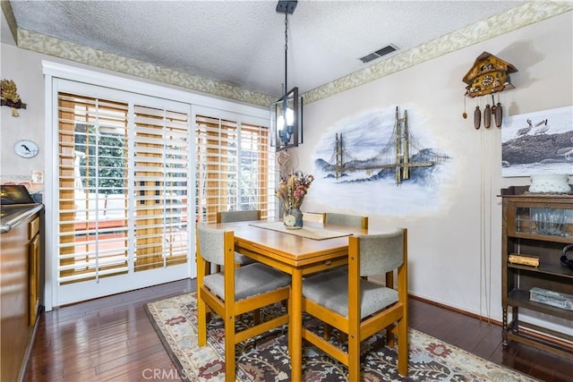 1595 15th St, Los Osos, CA 93402 - dining area with a textured ceiling, hardwood / wood-style floors, and healthy amount of natural light