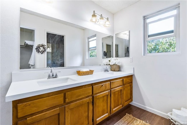 1595 15th St, Los Osos, CA 93402 - full bathroom with double vanity and wood finished floors