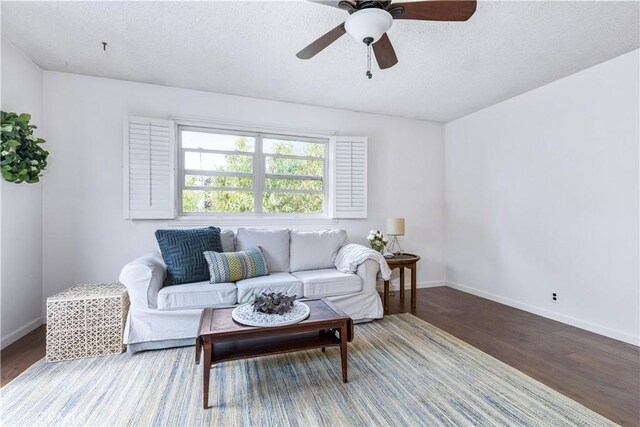 1595 15th St, Los Osos, CA 93402 - living area featuring wood finished floors, ceiling fan, and a textured ceiling