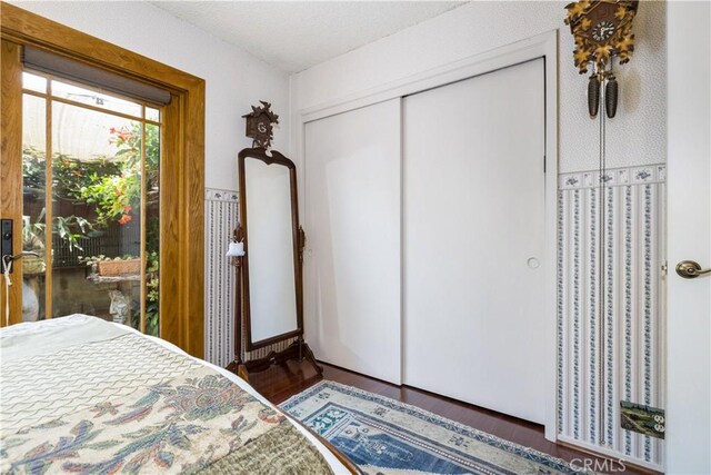 1595 15th St, Los Osos, CA 93402 - bedroom with wood finished floors and a closet