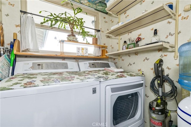 1595 15th St, Los Osos, CA 93402 - laundry area featuring washing machine and dryer and wallpapered walls