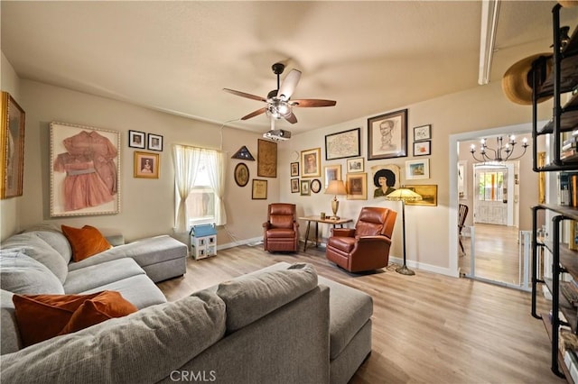 1711 Shasta St, Anderson, CA 96007 - living area with ceiling fan, wood finished floors, and a chandelier